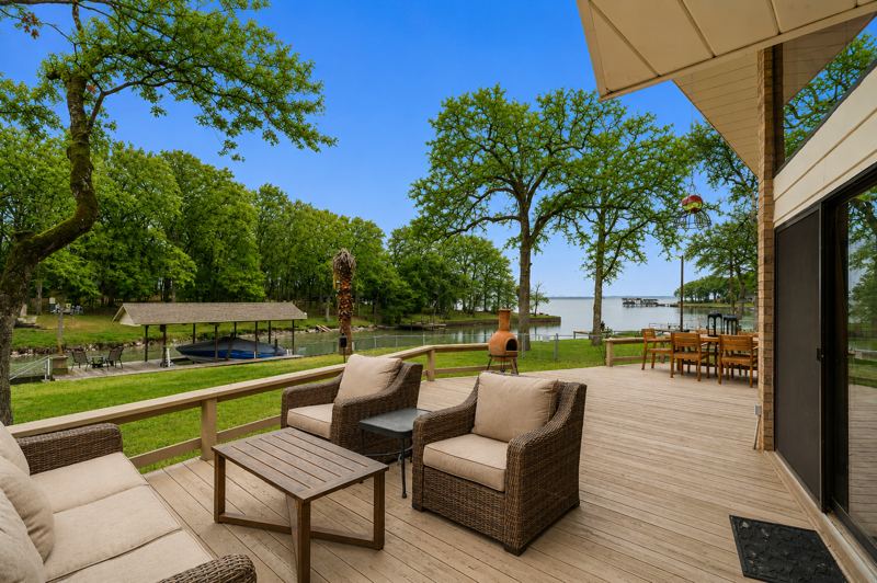Deck overlooking Cedar Creek Lake and the covered boat dock